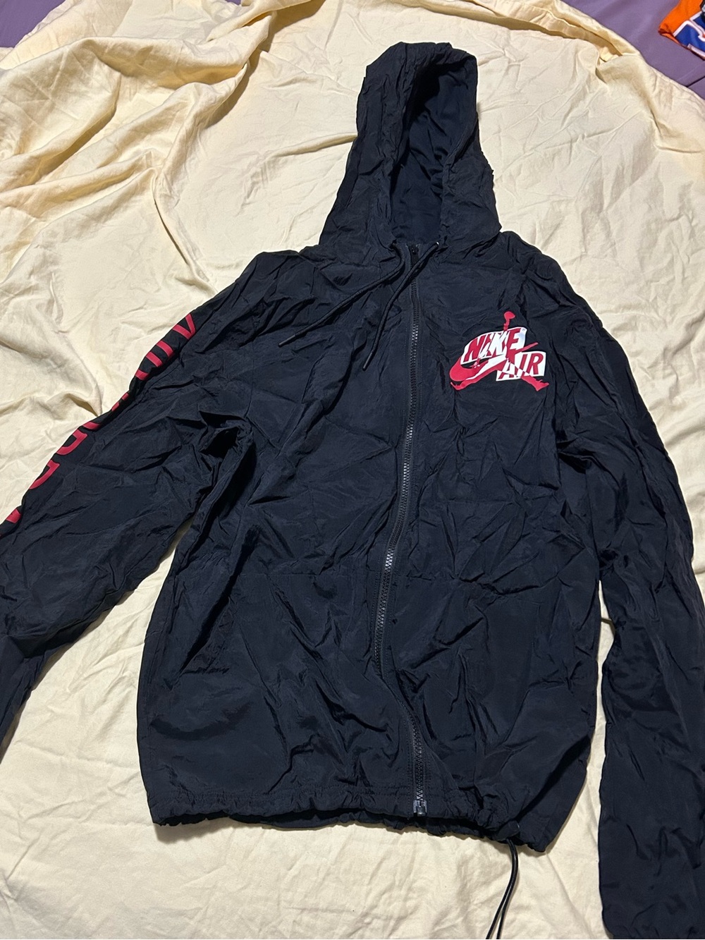 Nike Black Hooded Windbreaker Jacket with Red Logo Accents